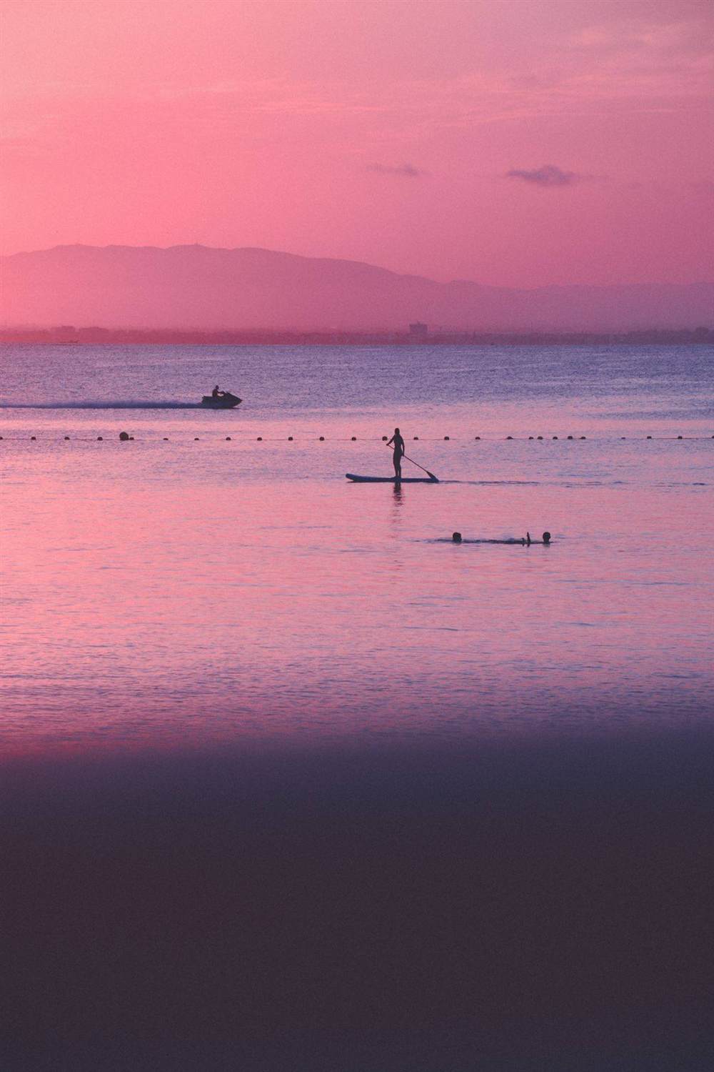 Atardecer en La Manga del Mar Menor con deportes acuáticos